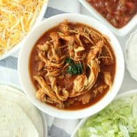 If you are looking for a crockpot chicken taco recipe, these crockpot shredded chicken tacos are super easy, and out of this world good!