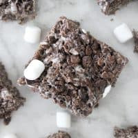 Super easy and delicious chocolate rice crispy treats! Perfect summer treat for when you don't want to turn on those ovens!