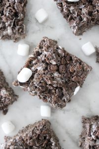 Super easy and delicious chocolate rice crispy treats! Perfect summer treat for when you don't want to turn on those ovens!