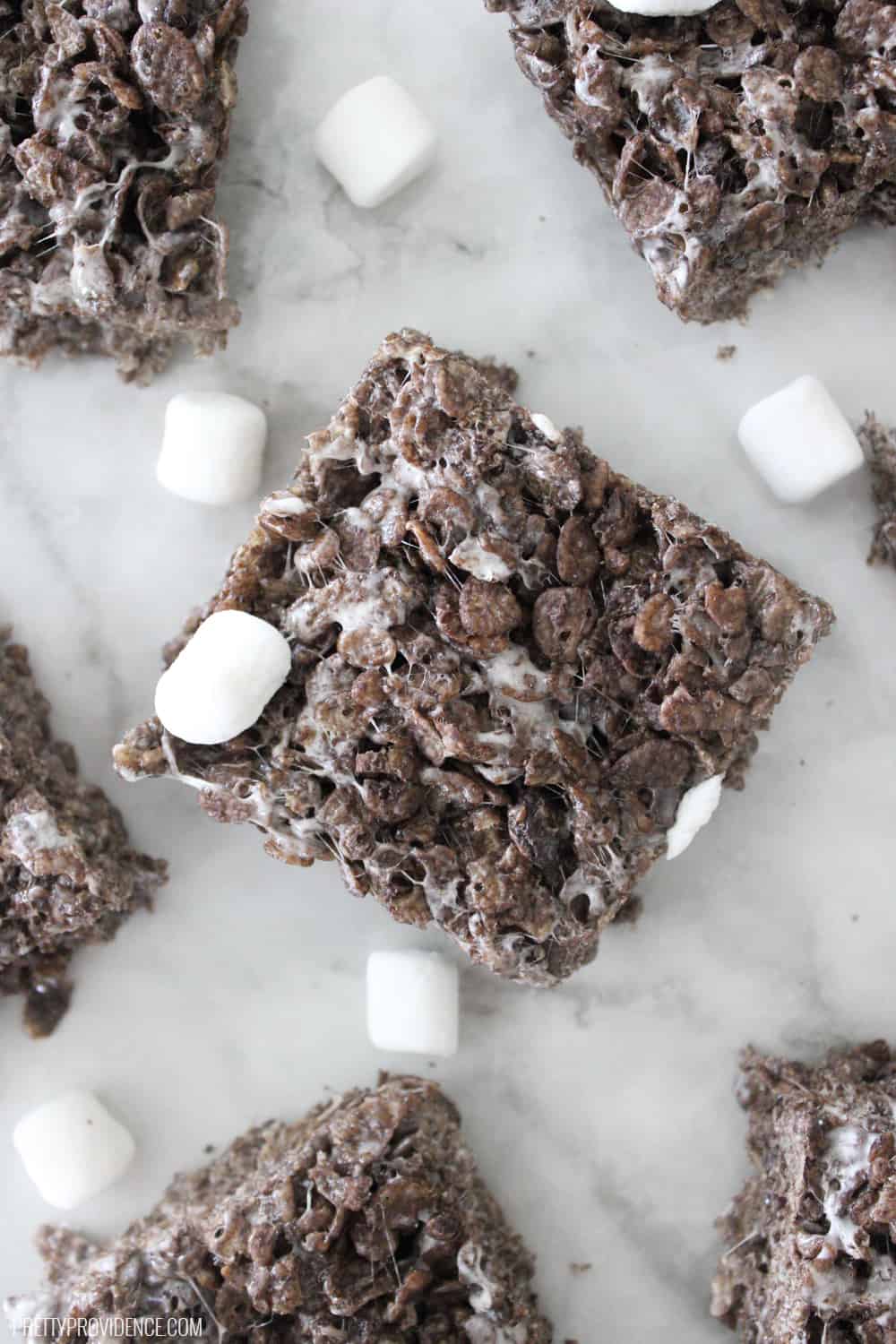 Super easy and delicious chocolate rice crispy treats! Perfect summer treat for when you don't want to turn on those ovens! 