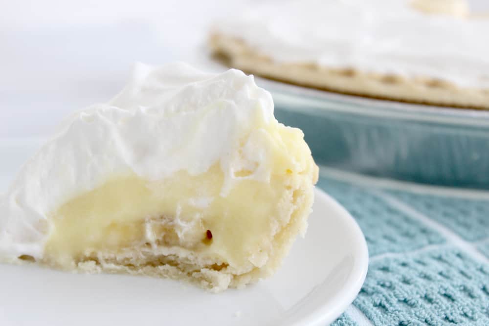 banana cream pie with a slice missing