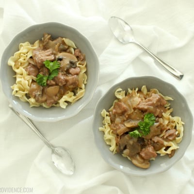 Easy beef and gravy over noodles is the PERFECT hearty weeknight meal when you are on a budget! The crock pot tenderizes the cheaper cuts of meat and by the time its done it is fall apart tender! One of our favorite family meals!