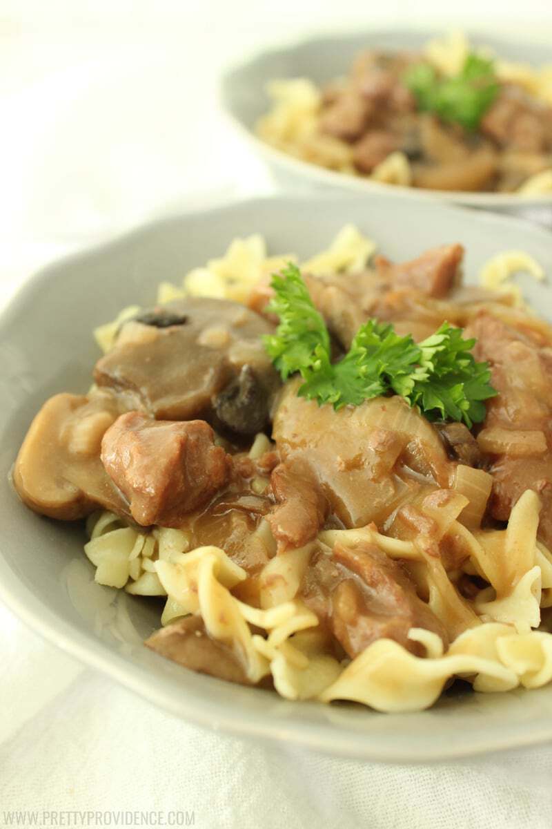 Easy beef and gravy over noodles is the PERFECT hearty weeknight meal when you are on a budget! The crock pot tenderizes the cheaper cuts of meat and by the time its done it is fall apart tender! One of our favorite family meals! 