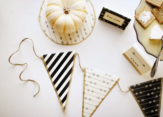 Thanksgiving black, white, and gold free printable decorations and white pumpkins.