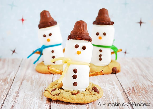 Marshmallow Snowmen on top of chocolate chip cookies