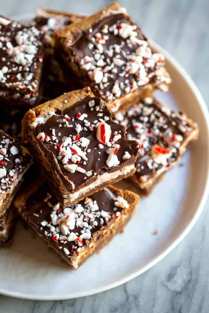 Peppermint Brownies with Chocolate Frosting and crushed candy canes on top