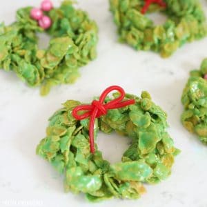 Christmas cornflake wreaths marshmallow treats with red licorice bows and candies