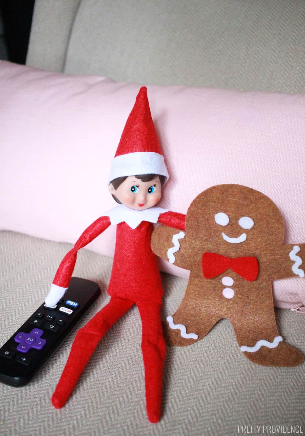 Elf on the Shelf watching tv