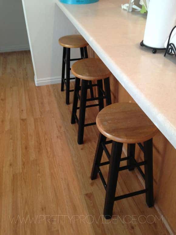 Bar stools at a kitchen counter.