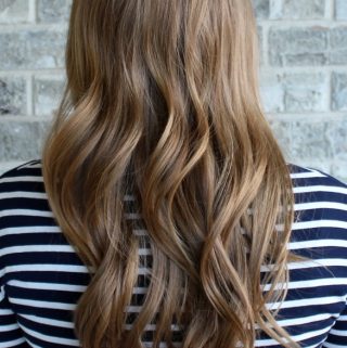 the case for growing out your hair: save hundreds of dollars a year on trims and other maintenance!