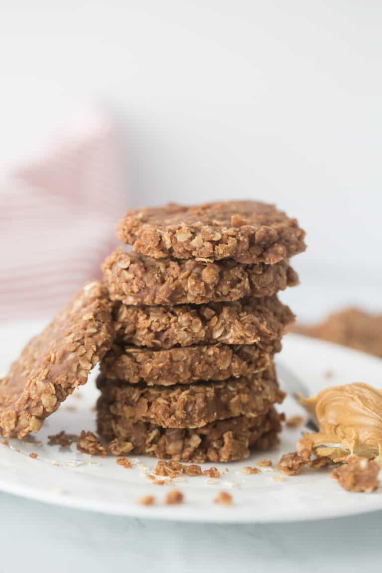 chocolate no bake cookies stacked on a plate
