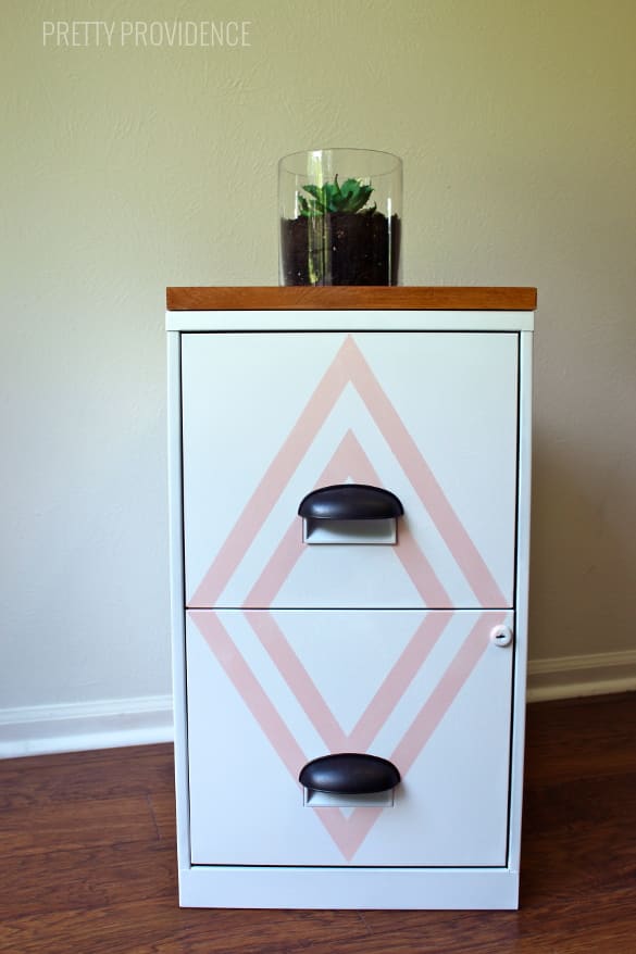 Filing cabinet makeover! A little paint and some new hardware make this a beauty instead of a boring eyesore!