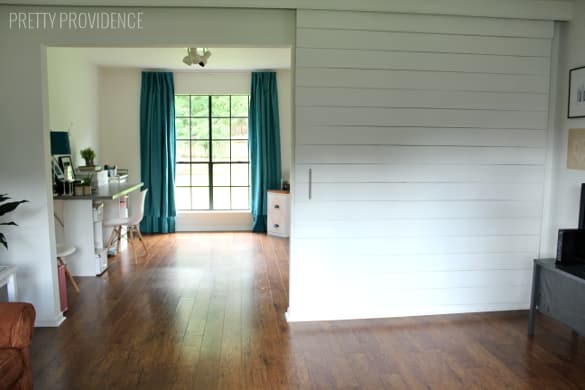 DIY Sliding Barn Door - modern way to add a door to your house!