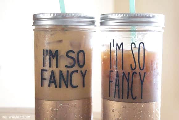 Two mason jar tumblers with black vinyl decals 'I'm so fancy' iced coffee