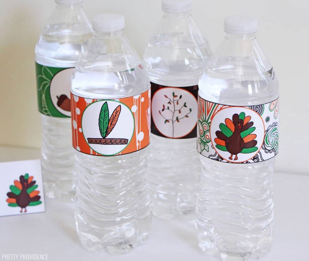 4 water bottles with Free Thanksgiving Printables Water Bottle labels on them.