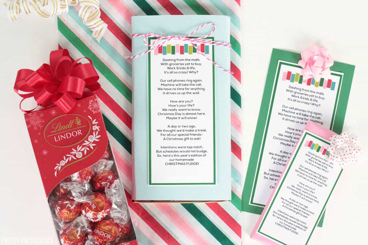 Lindor Milk Choocoate truffles, homemade christmas fudge poem printable gift tag and wrapping paper on a white surface.