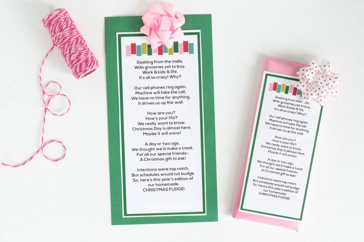 Homemade Christmas fudge poem on a candy bar with green paper behind it and a pink bow. Christmas neighbor gift idea.