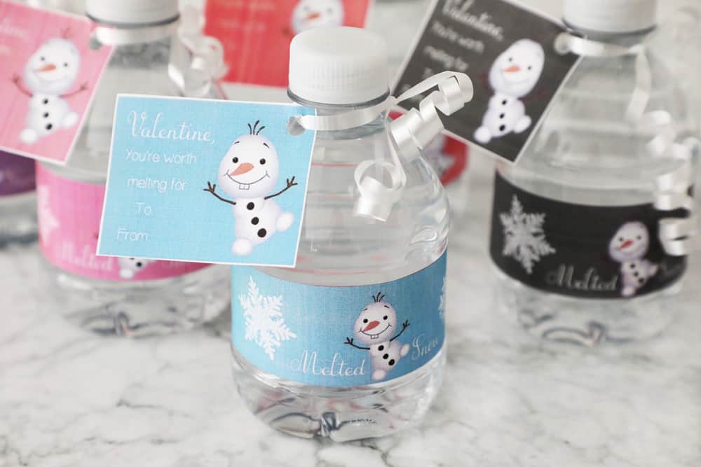 Mini water bottle with free printable frozen valentine attached with white ribbon