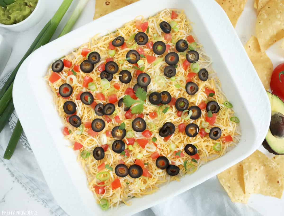 Best seven layer dip ever! There is a secret ingredient that takes this to another LEVEL. 