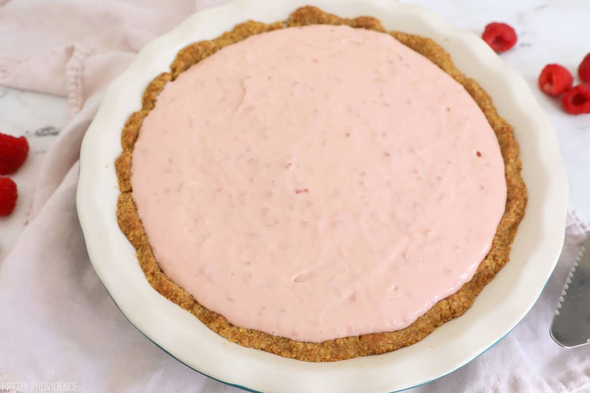 Beat cream cheese with beaters until fluffy. Add in sweetened condensed milk and beat until smooth. Stir in lemon juice and vanilla. Pour in pie crust and refrigerate for at least 4 hours or until set. Serve with your favorite topping. 