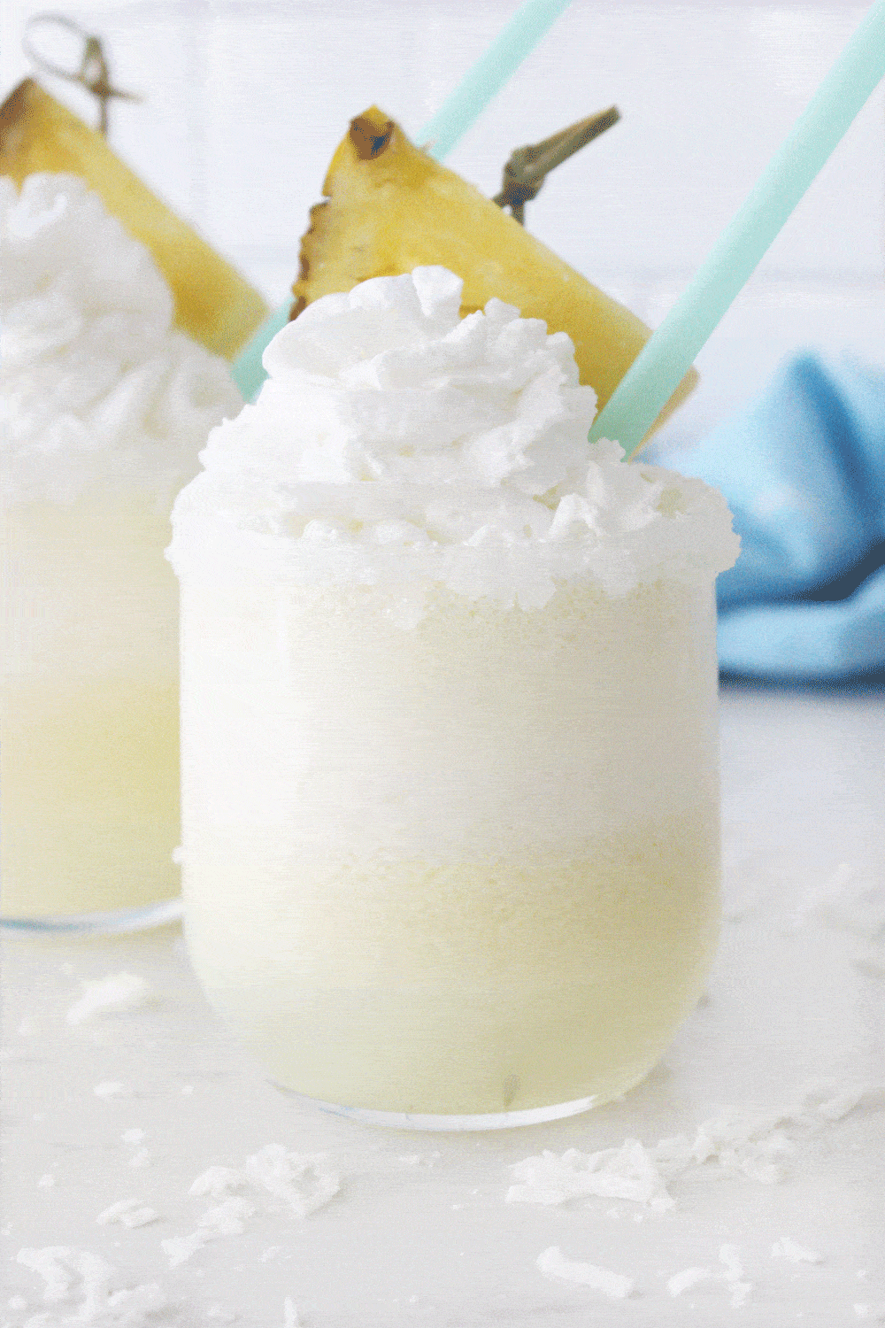 coconut pineapple whip garnished with fresh pineapple