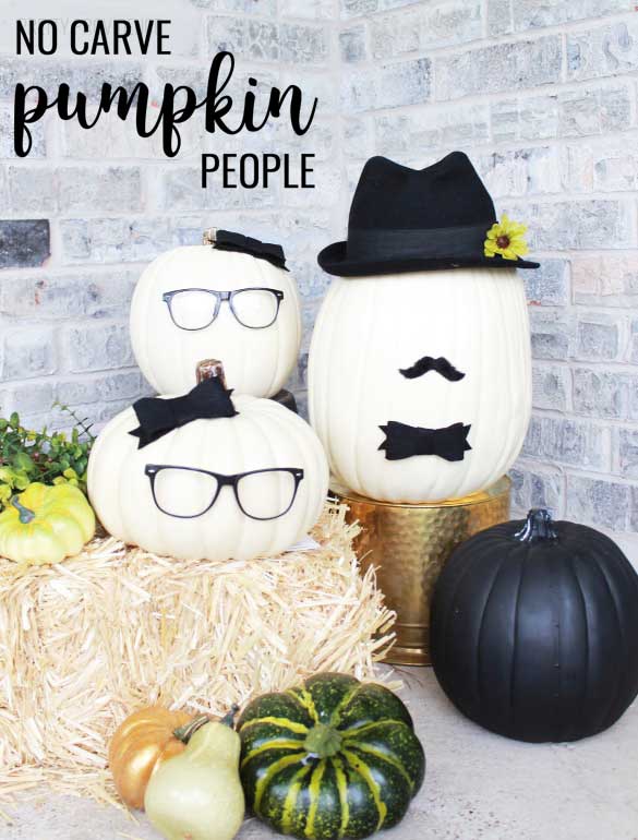 No-Carve Pumpkins decorated to look like people with glasses, bows, mustache and hats.