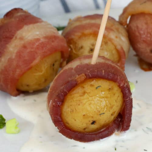 Crispy Bacon Wrapped Potatoes with Creamy Dill Sauce