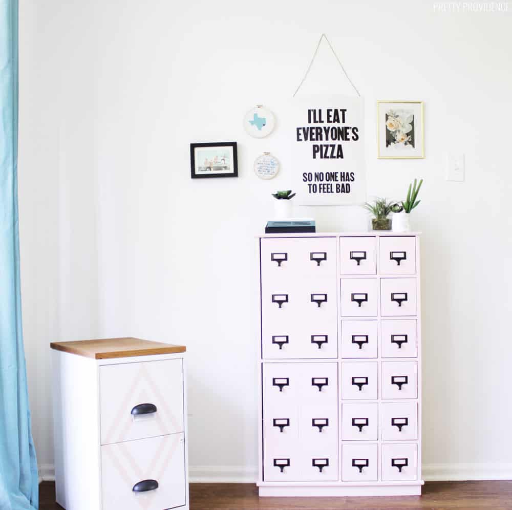 Fun pink card catalog in a craft room! Great for small craft supply storage.