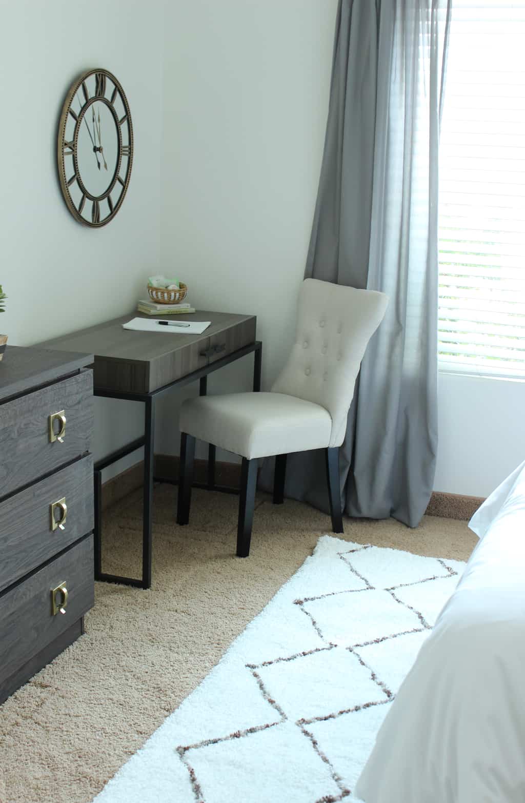 I am in love with this clean and classy guest bedroom makeover! Definitely wanting a few of these pieces for my house! 