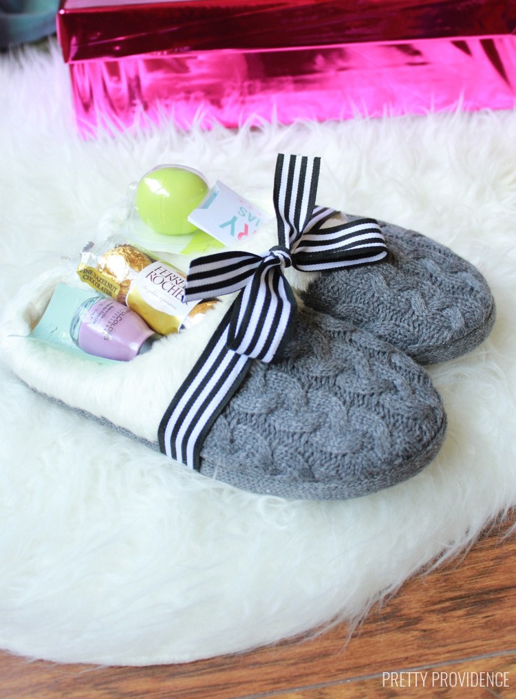 Okay I love this idea! Get slippers and fill them with little treats or gift cards, so fun. prettyprovidence.com