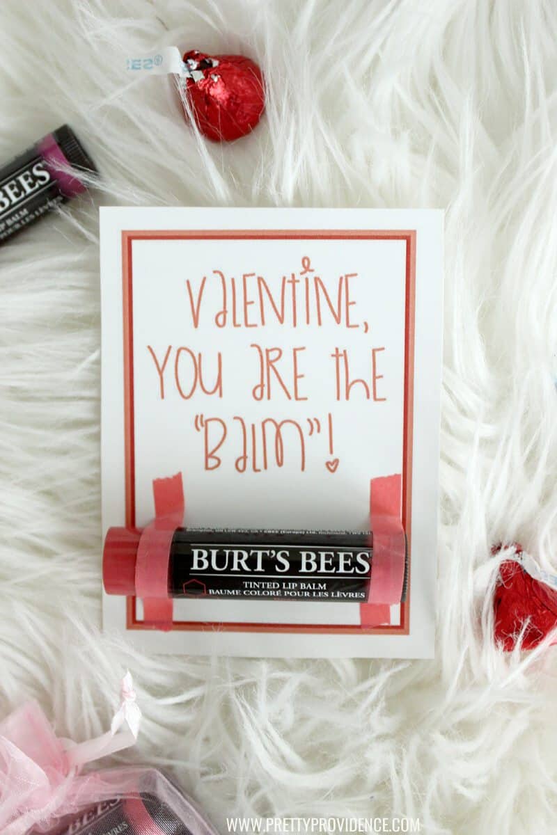 Burt's Bees lip balm attached to a "valentine you are the balm" card