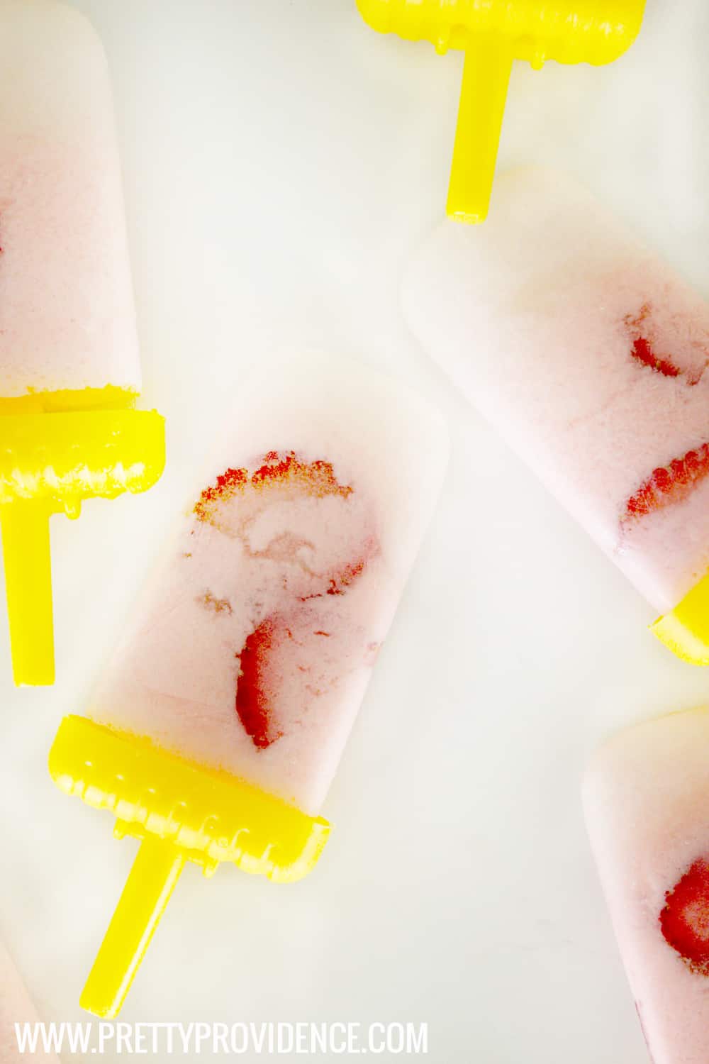 Talk about delicious! These frosted strawberry lemonade popsicles are only 35 calories each! Great way to curb that sweet tooth! 