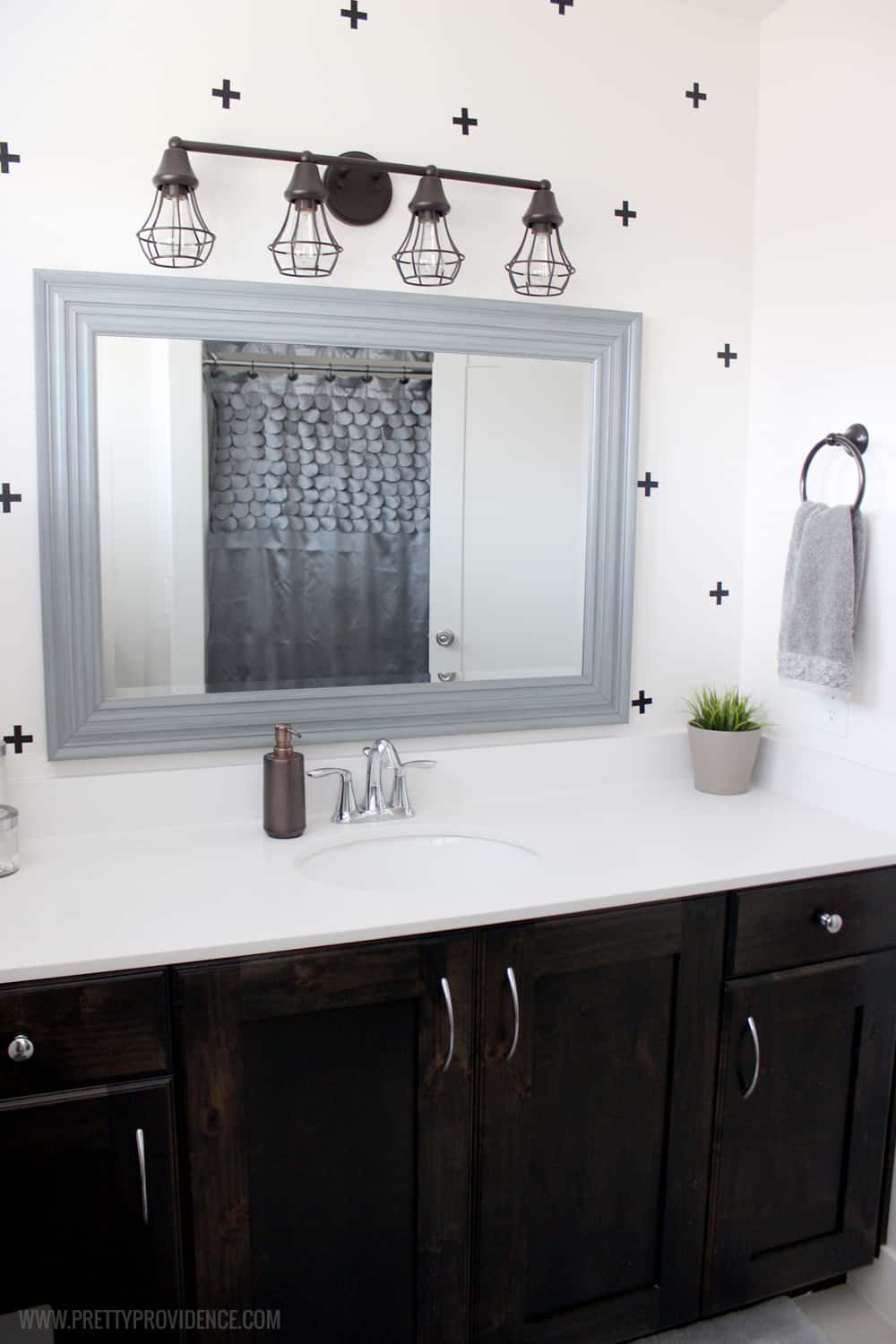 A super fun and easy boys bathroom makeover! on a budget! I can't believe how easy those wall decals were to apply! 