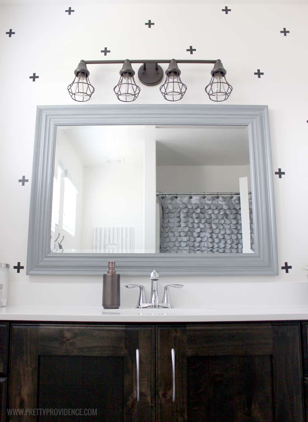A super fun and easy boys bathroom makeover! on a budget! I can't believe how easy those wall decals were to apply! 