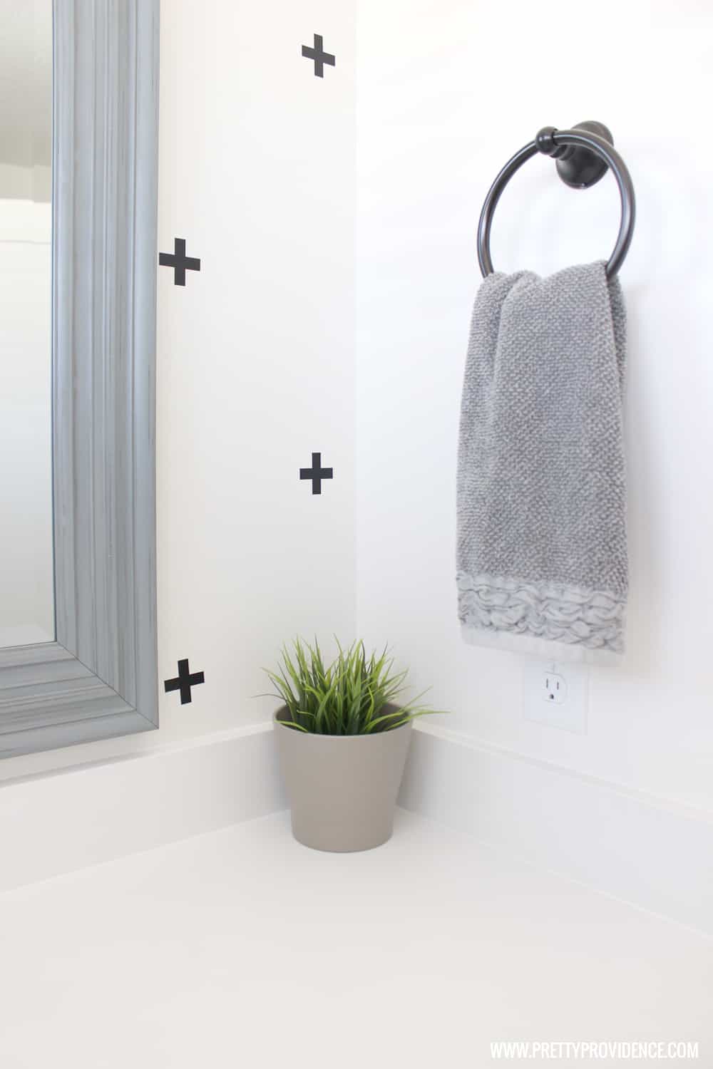 A super fun and easy boys bathroom makeover! on a budget! I can't believe how easy those wall decals were to apply! 