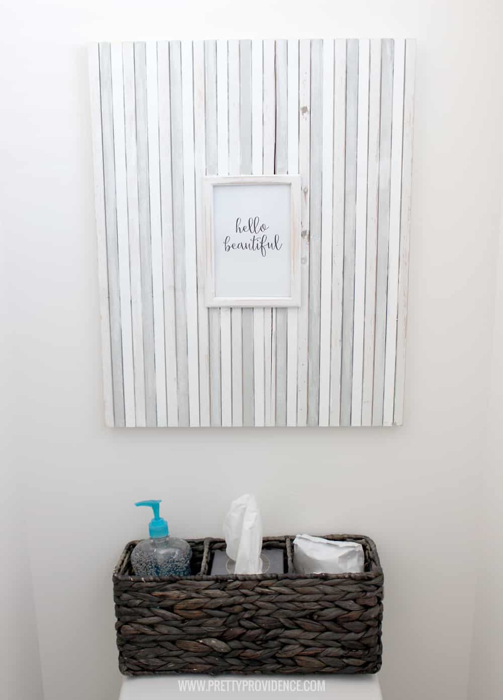A super fun and easy boys bathroom makeover! on a budget! I can't believe how easy those wall decals were to apply! 