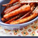 Brown Sugar Balsamic Roasted Carrots in a blue dish with text label on the photo.