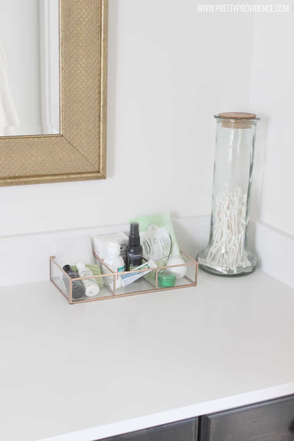 I am loving this guest bathroom! Especially love the little touches she did to make the guests feel welcome and comfortable! So simple, but it goes a long way! 
