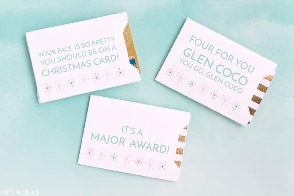 Four Christmas Gift Card Envelopes with Funny Movie Quotes on Blue Background