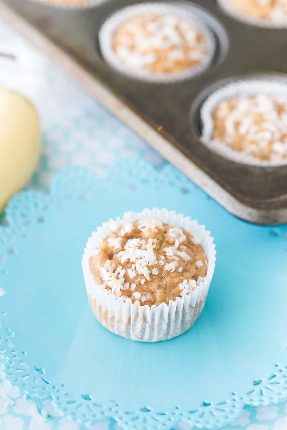 These Banana Coconut Muffins are delicious and simple! Coconut sugar and applesauce makes muffins something you can feel a little less guilty about! 