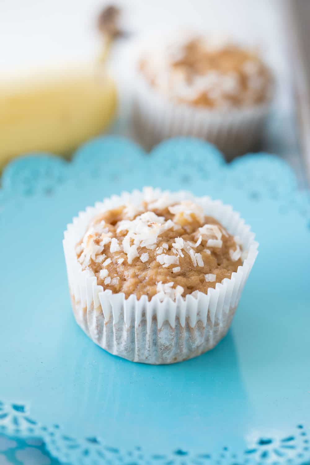 These Banana Coconut Muffins are delicious and simple! Coconut sugar and applesauce makes muffins something you can feel a little less guilty about! 
