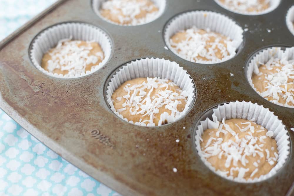 These Banana Coconut Muffins are delicious and simple! Coconut sugar and applesauce makes muffins something you can feel a little less guilty about! 