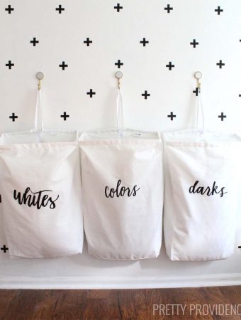 I love this space-saving laundry organization idea! The bag labels are so pretty too!