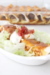 Okay these beef enchiladas are so easy! Just through the stuff in the crockpot in the morning then all you have to do is scoop some of the meat mixture, add the cheese, roll up and bake a few minutes! SO easy and SO delicious! A family favorite for sure!