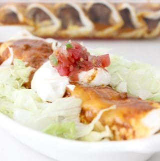 Okay these beef enchiladas are so easy! Just through the stuff in the crockpot in the morning then all you have to do is scoop some of the meat mixture, add the cheese, roll up and bake a few minutes! SO easy and SO delicious! A family favorite for sure!