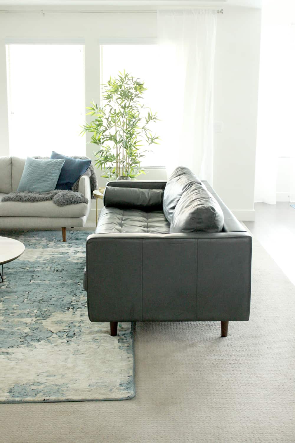I'm totally in love with this cozy, modern living room space! It makes the most out of the size, and pairs looks and functionality so well! Great prices, too! 