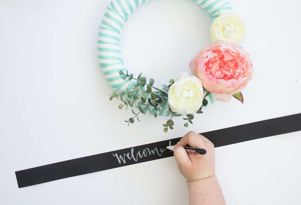 This easy spring wreath is easy to make with ribbon, faux flowers and a little bit of fun! 