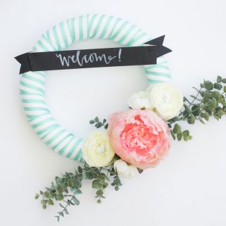 This easy spring wreath is easy to make with ribbon, faux flowers and a little bit of fun!
