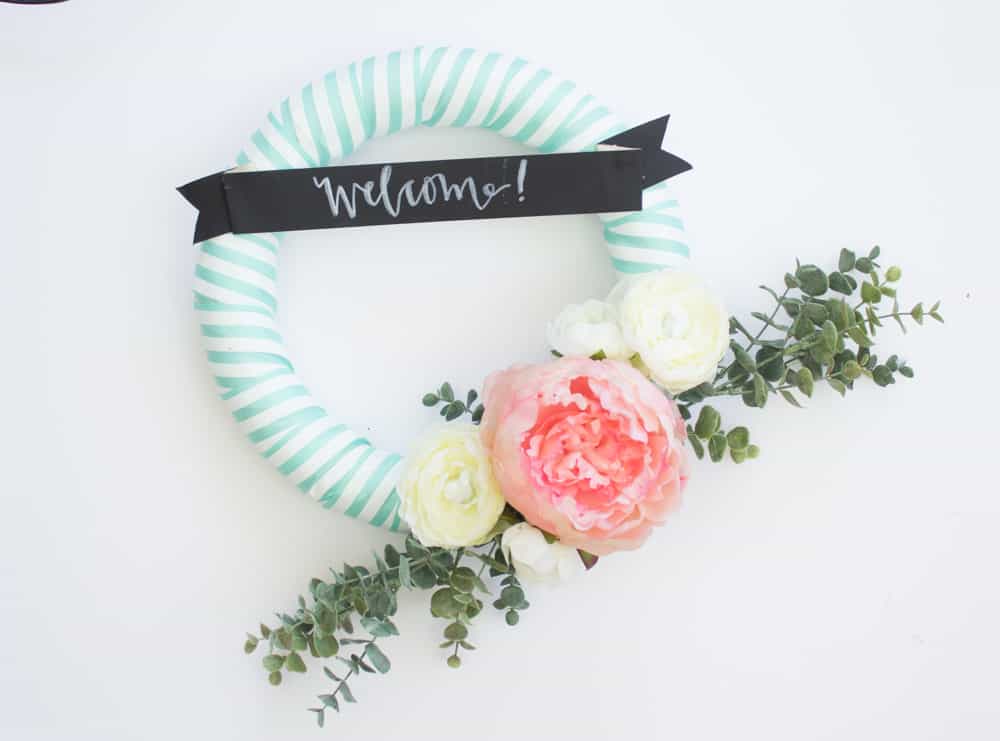 This easy spring wreath is easy to make with ribbon, faux flowers and a little bit of fun!