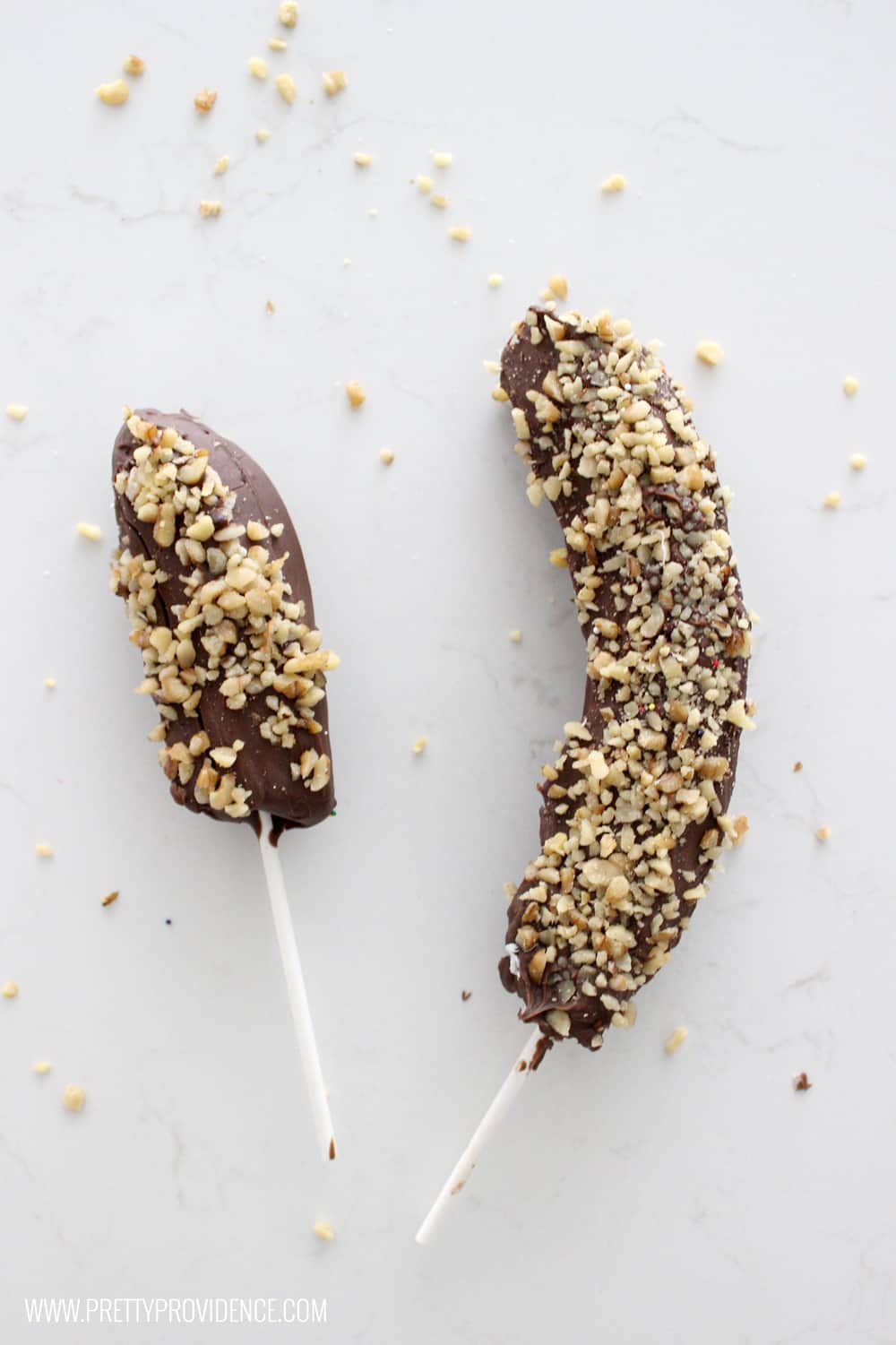Not only are these frozen chocolate covered bananas easy to make, they are freaking delicious! Such a fun summer treat, and lots better for you than a regular ice cream bar! 